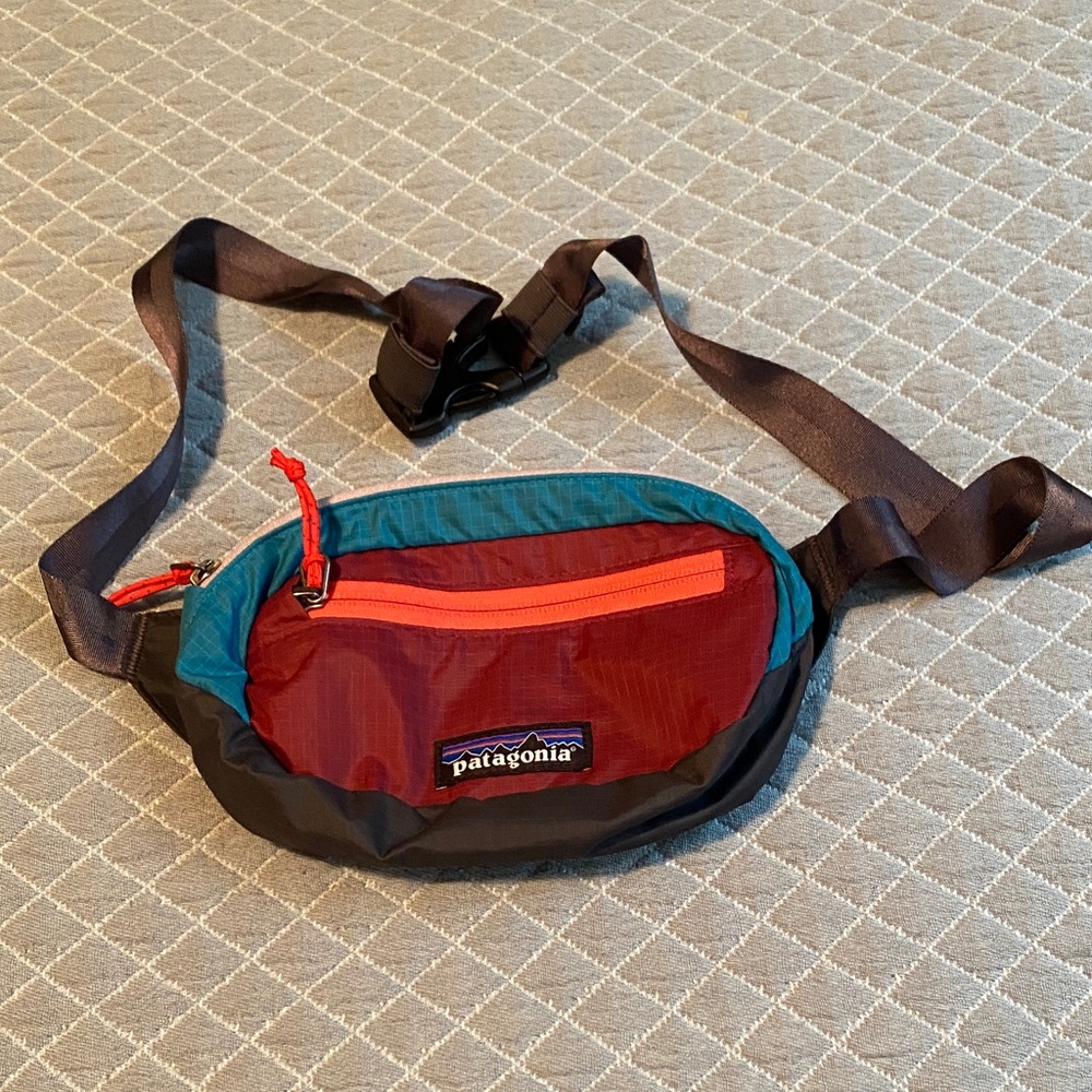 Patagonia Ultralight Black Hole Mini Hip Pack in red teal and grey